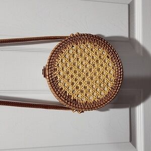 Genuine leather straw bag. Linen interior. circle shape. New with tags